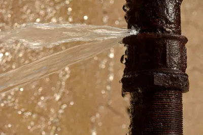 an older pipe with a water leak