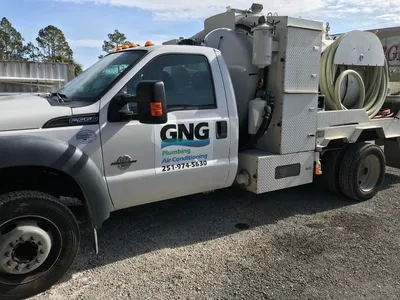 vacuum truck with hydrojetter used to pump and clean sewer lift stations and grinder pump basin
